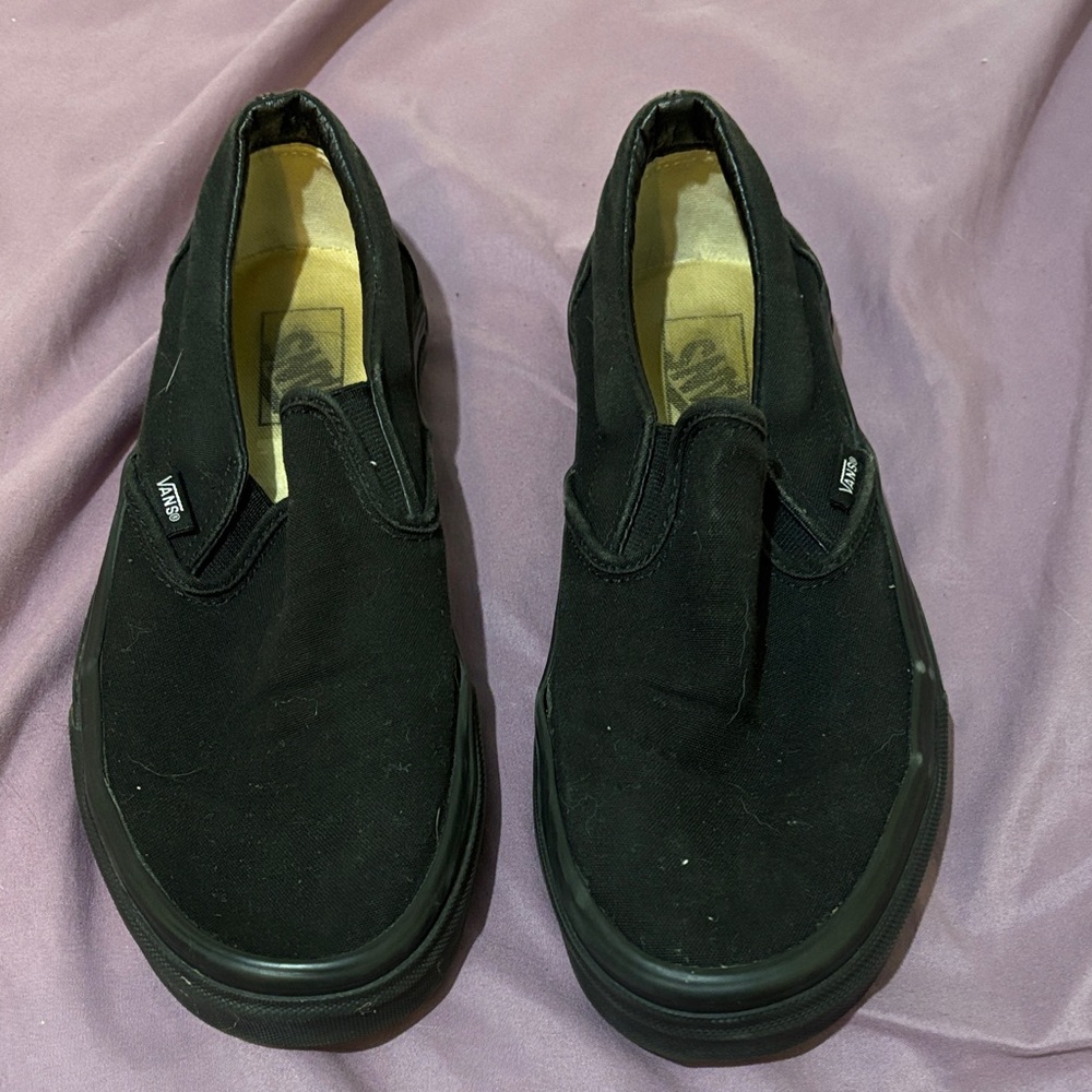 Vans Men's Black Canvas Slip-Ons